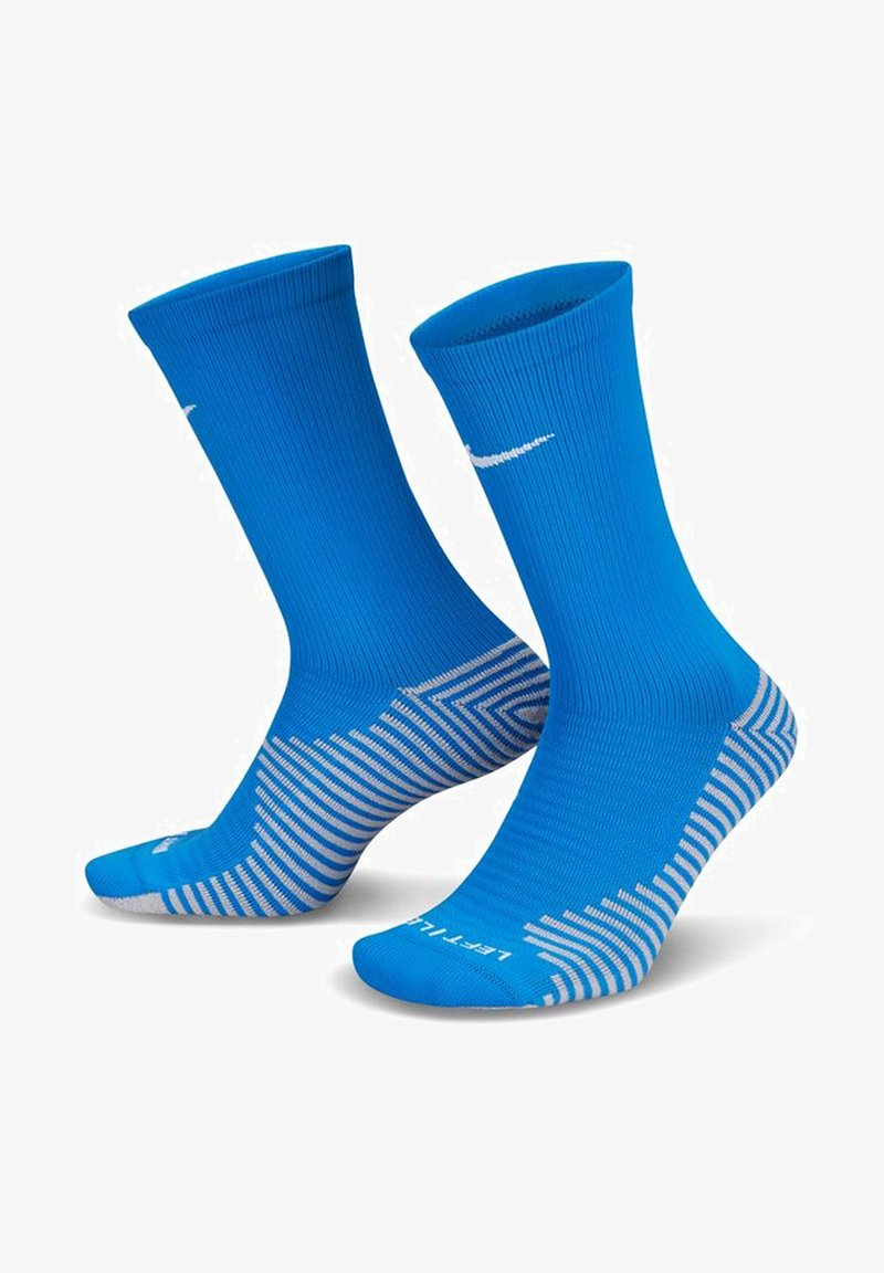 Sinised sportlikud sokid ribakujundusega, millel on valge Nike logo ja tekstuurse triibulise mustriga tallad, mis tagavad haarde ja toe.