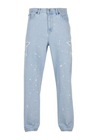 Light blue denim jeans with a relaxed fit, featuring star-shaped cutouts, paint splatters, and a classic five-pocket design.
