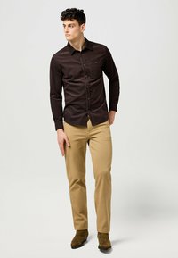 Wrangler TEXAS - Vaqueros rectos - tigers eye