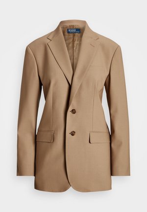 Tan dobbeltbrystet blazer lavet af glat stof med to forlommer, brune knapper og en skræddersyet pasform. Har klapper i nakken.