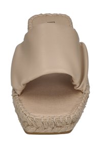 Beige faux leather slide sandal with a wide, crumpled upper, jute-wrapped platform, and flat sole. Textured surface with stitching details.