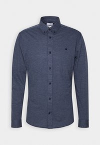 Långärmad, knäppskjorta i marinblått med krage. Tyget har en subtil struktur. Har en liten logotyp på vänster bröst.