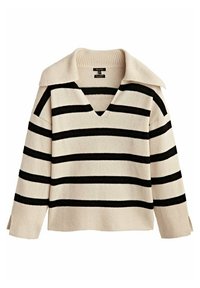 Raidallinen neulepaita, joka on valmistettu pehmeästä kankaasta. Se on kermaisen värinen ja siinä on rohkeat mustat raidat, V-pääntie sekä leveät ribbauskaitaleet kauluksessa ja hihoissa.