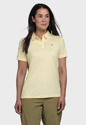 Helle gelbe Polohemd mit Knopfleiste, kurzen Ärmeln und subtiler Textur. Mit einem kleinen grauen Logo auf der Brust.