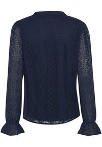 Blusa a maniche lunghe blu navy con un motivo a diamante testurizzato, colletto con bottoni e polsini svasati, realizzata in tessuto leggero e trasparente.