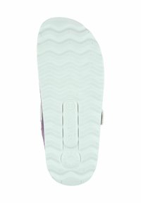 Sole of a shoe featuring a wavy tread pattern in light gray, with a round branding emblem and size marking (37) at the center.