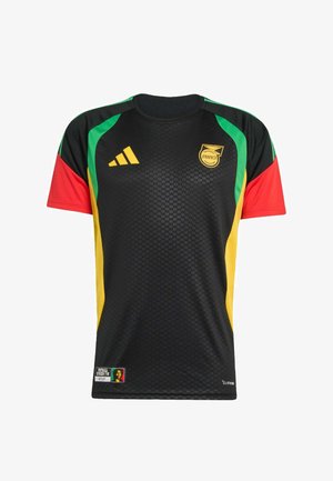 Maglia da calcio nera a maniche corte con accenti rossi, verdi e gialli, logo della Jamaica Football Federation e marchio Adidas sul petto.