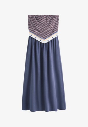 Lange rok met een donkerblauwe effen onderkant en een patroon aan de bovenkant met kastanjebruine, witte en blauwe ruiten.