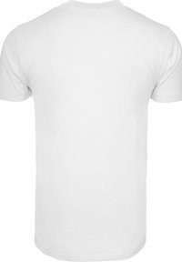 White cotton t-shirt, short sleeves, regular fit, round neckline. Soft texture, clean edges, no visible patterns or logos.