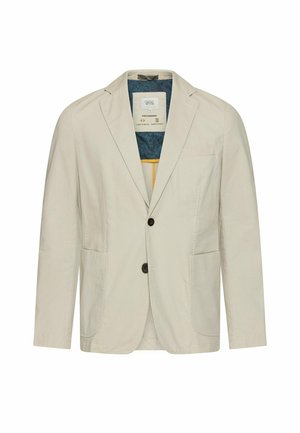 Lysebeige herreblazer med notchede revers, to sorte forreste knapper, to nederste påsyede lommer og en brystlomme.