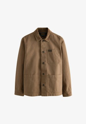 Braune Canvasjacke mit Cordkragen, Knopfverschluss und zwei aufgesetzten Taschen vorne. Sie hat ein kleines Markenlabel auf der Brusttasche.