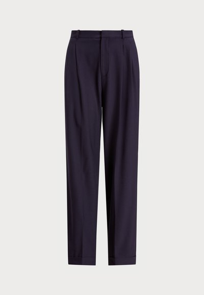 Ναυτικές παν trousers με κομψή εφαρμογή, λεπτομέρειες πτυχών και λεία υφή. Κατασκευασμένα από ελαφρύ ύφασμα με ευθεία γραμμή.