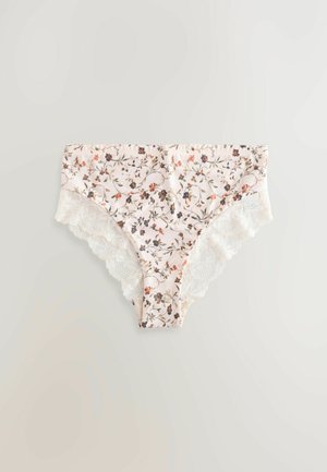 Culottes en coton à motifs floraux avec un fond rose clair, ornées d'une dentelle sur les côtés et d'un motif floral épars dans des couleurs claires et foncées.