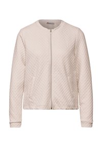 Světle béžová prošívaná bunda s kulatým výstřihem, plným zipem a dvěma předními kapsami. Obsahuje žebrované manžety a texturovaný vzor látky.