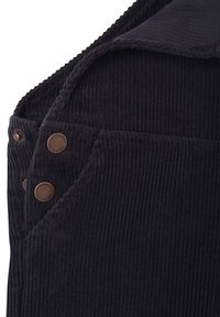 Black corduroy overalls featuring textured fabric, two metal snap buttons, and a folded neck design. No visible patterns or accents.