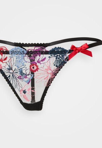 Črna čipkasta tangica z barvitim cvetličnim vezenjem v rdeči, modri in roza barvi. Vključuje rdeč trak kot poudarek in valovite robove.