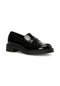 Black patent leather loafers with a low block heel, featuring a decorative strap and raised stitching along the edge. Smooth, glossy texture.