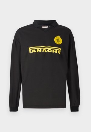Polo à manches longues noir avec un col en V, portant une inscription "PANACHE" jaune et un emblème jaune, avec des manches à poignets.