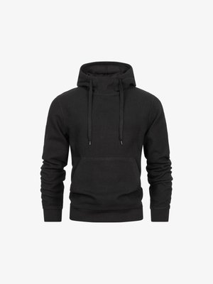 Schwarze gestrickte Kapuzenpulli mit hohem Kragen, Kordeln, einer Vordertasche und gerippten Bündchen. Weicher Stoff mit figurschmeichelndem Design.