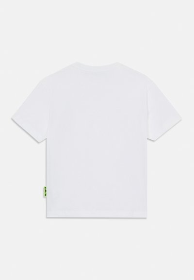 White cotton t-shirt with short sleeves, rounded neckline, and a small green tag on the left side near the hem.