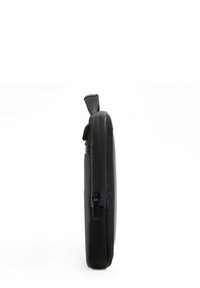 Black laptop sleeve featuring a slim design, smooth texture, and a side zipper closure with a small strap for easy carrying.