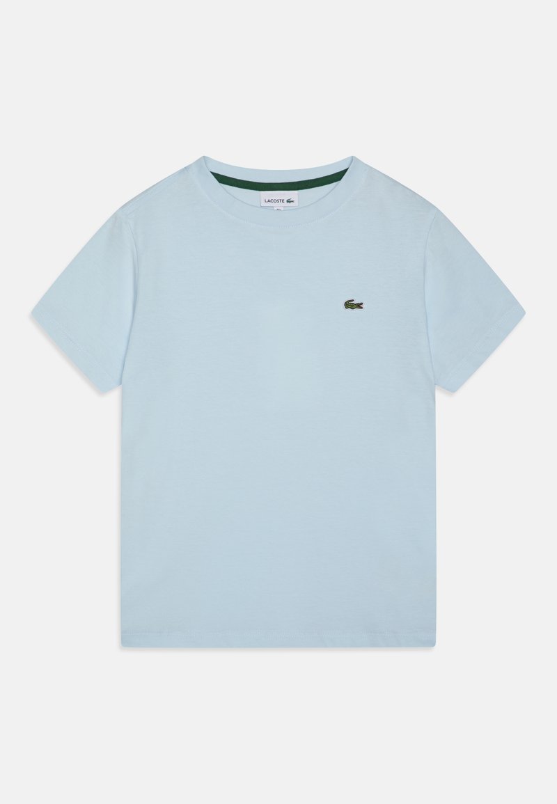 T-shirt in cotone azzurro chiaro con maniche corte, scollatura rotonda e un piccolo logo ricamato verde sul petto.