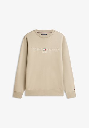 Béžová mikina s dlhými rukávmi a okrúhlym výstrihom, logo "Tommy Hilfiger" a emblém vlajky na hrudi a malá vlajka na ľavom rukáve na zápästí.