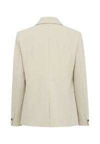 Blazer beige con colletto a punta, linee pulite, spacco posteriore singolo e dettagli in bottoni sui polsini. Texture liscia, vestibilità su misura.