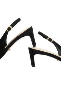 Black suede slingback heels with pointed toes, mid-height block heels, and metallic buckle accents on ankle straps. Smooth interior lining.