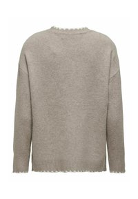Übergroßer beiger Pullover mit strukturiertem Strick, gewelltem Saum und gerippten Bündchen. Mit einem runden Ausschnitt und dekorativen Verzierungen.