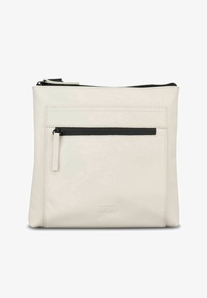 Pochette rectangulaire en cuir couleur crème avec une poche avant à fermeture éclair noire et une fermeture éclair supérieure, détails des coutures visibles.