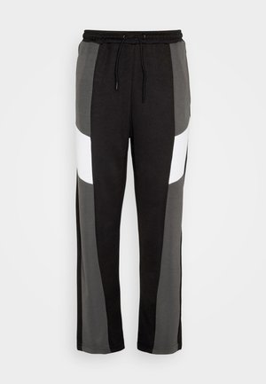 Night Addict UNISEX - Παντελόνι φόρμας - black