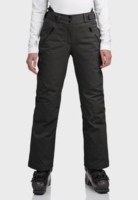 Schwarze Schneehosen mit geradem Schnitt, zwei seitlichen Taschen, verstellbarem Bund und verstärkten Säumen. Glattes, wasserabweisendes Material.