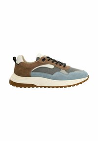 Sneakers featuring brown suede, blue textile, and mesh accents. Thick white sole with a textured brown outsole. Black laces and detail stitching.