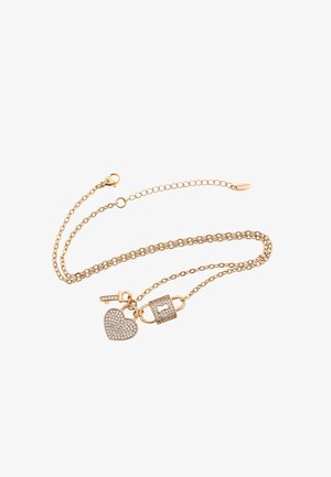 Arany színű nyaklánc, lánc kialakítással, szív alakú charm rhinestone-okkal, lakat charm és kulcs medál.
