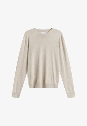 Beige pitkähihaisen pyöreäkauluksisen neuleen, jossa on resorit hihansuissa ja helmassa, valmistettu pehmeästä neuloksesta, esitetty valkoisella taustalla.