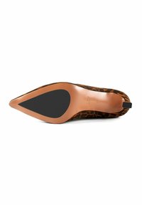 Leopard print high heel shoe with a pointed toe, brown suede upper, beige leather sole, and black rubber accents on the bottom.