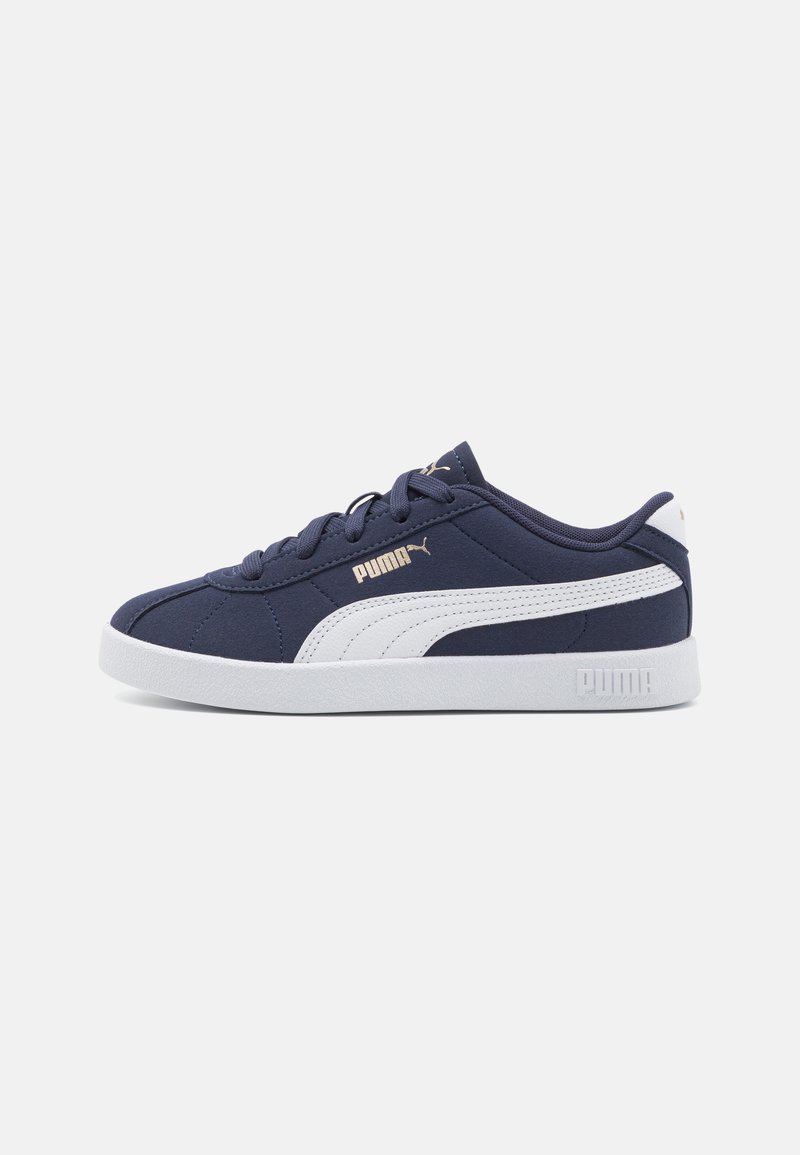 Navy blue sneaker made of textile with white accents, lace-up design, padded tongue, and white rubber sole. Features a logo on the side.
