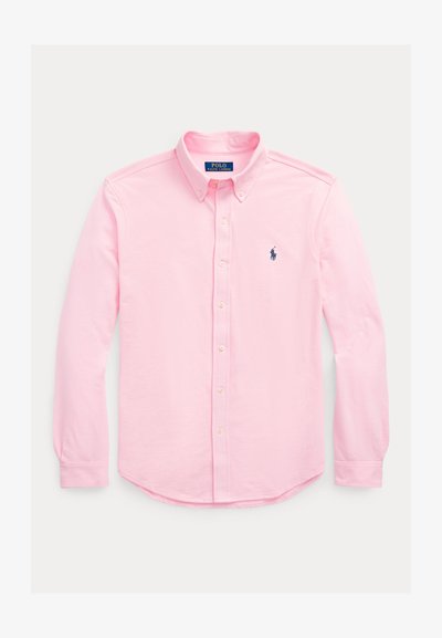 Pink button-down shirt with long sleeves, point collar, and a small blue logo on the left chest. Cotton fabric with a smooth texture.