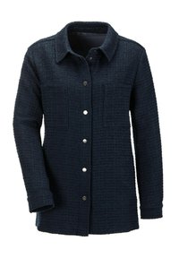 Woven navy jacket featuring a textured pattern, a collared neckline, front button closure, and two chest pockets with snap buttons.