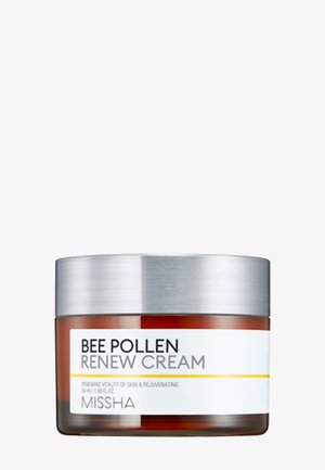 Mänty-keltainen purkki Missha Bee Pollen Renew Cream -voidetta hopeisella kannella, merkitty ihon elinvoimaisuuteen ja uudistamiseen, 50 ml.