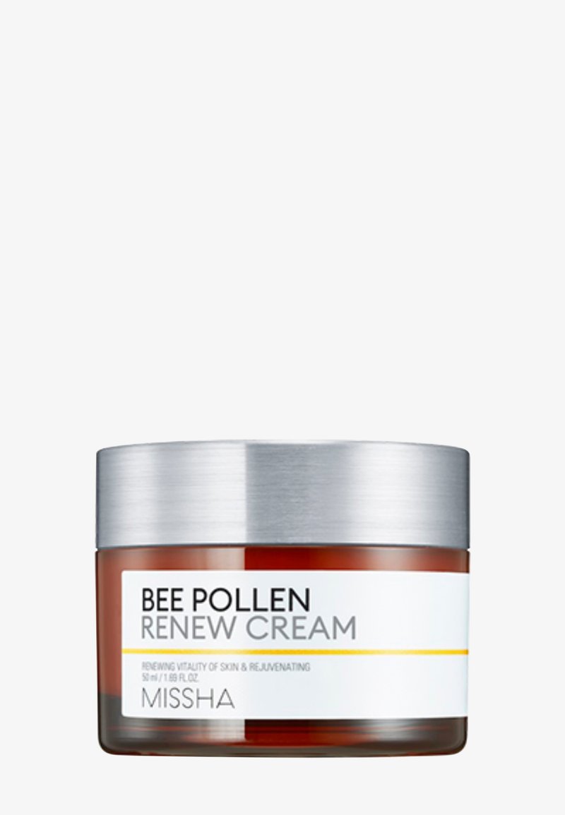 Pot ambré de Missha Bee Pollen Renew Cream avec couvercle argenté, étiqueté pour vitalité et rajeunissement de la peau, taille 50 ml.