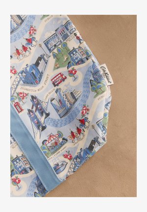 Niebieska bawełniana tkanina z nadrukiem nawiązującym do Londynu, przedstawiająca budynki, kwiaty i rzekę. Ozdobiona jasnoniebieskim paskiem i metką z logo.