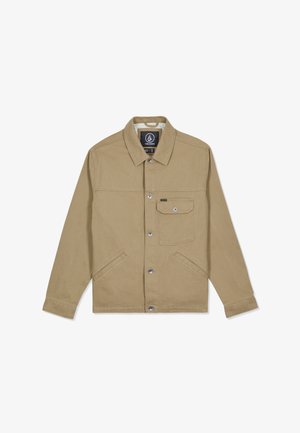 Giacca beige con bottoni, colletto, maniche lunghe, due tasche laterali e una tasca sul petto con patta e chiusura a bottone.