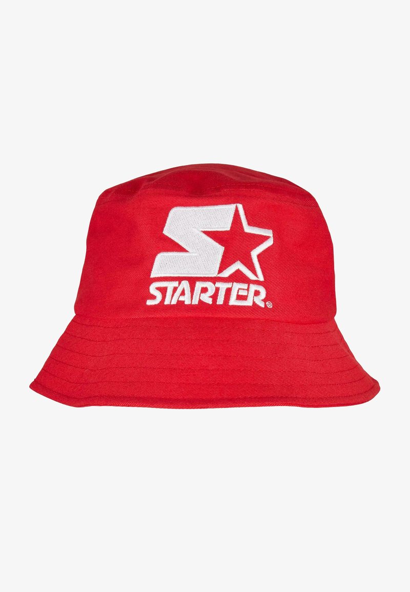 Chapeau seau rouge en coton. Présente un logo brodé blanc avec une étoile et le mot "STARTER". Large bord flexible.
