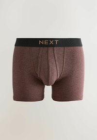Boxer da uomo color bordeaux con elastico nero e logo "NEXT" in beige, vista frontale su sfondo neutro.