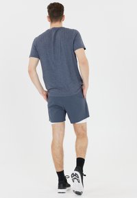 Endurance ABDON - Sport T-Shirt - ombre blue