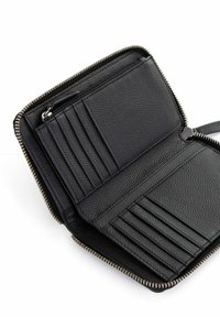 Black leather wallet with a zip-around closure. Interior features multiple card slots and a zippered compartment for coins. Textured finish.