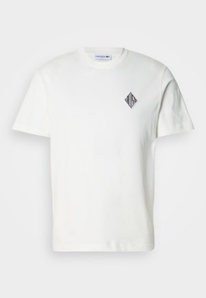 Witte katoenen T-shirt met een klein zwart diamantlogo op de borst, klassieke ronde hals en korte mouwen. Gladde textuur, casual pasvorm.