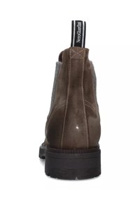 Brauner Wildleder-Stiefelette mit dunkel gummierter Sohle, grauen Stoffakzenten, hinterem Zugband mit der Aufschrift "NeroGiardini" und sichtbaren Steppnähten.